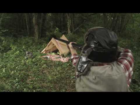 NSFW. A hunter shoots a bear!
